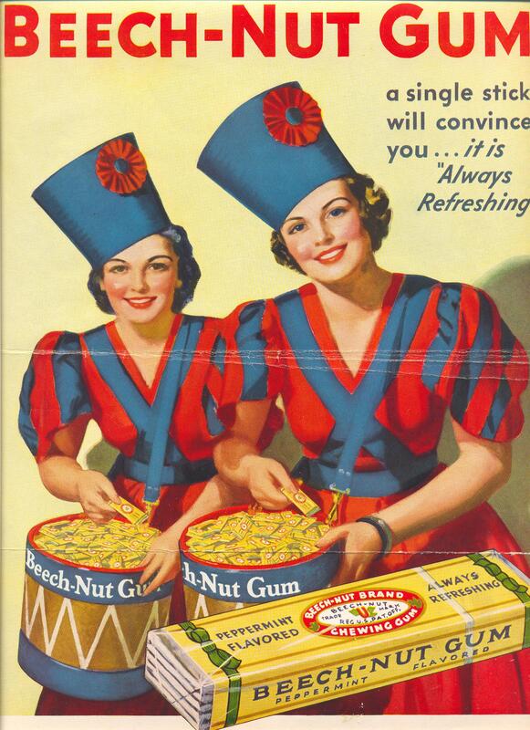 Two women in tall blue hats and red and blue dresses hold drums full of Beech-Nut peppermint gum. Both women have pale skin, short brown hair, red lips and cheeks. 